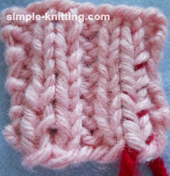 Weave in yarn tails in ribbing
