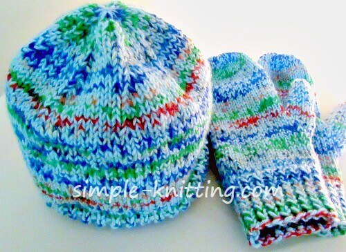knit hat and mittens on straight knitting needles
