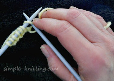 My way of holding yarn and needles
