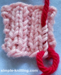 Weave in yarn tails in ribbing
