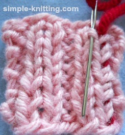 Weave in yarn tails in ribbing
