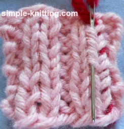 Weave in yarn tails in ribbing